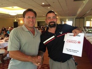 Wally Bogdanski, Yusen Logistics (right), winner of two roundtrip tickets, with Tim Fruehling of Air Canada Cargo.